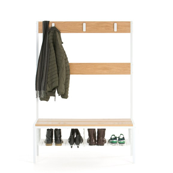 A hallway bench which harks back to the familiar changing room bench in a refined manner. Narrow seat, hooks and shoe storage maximises space.
